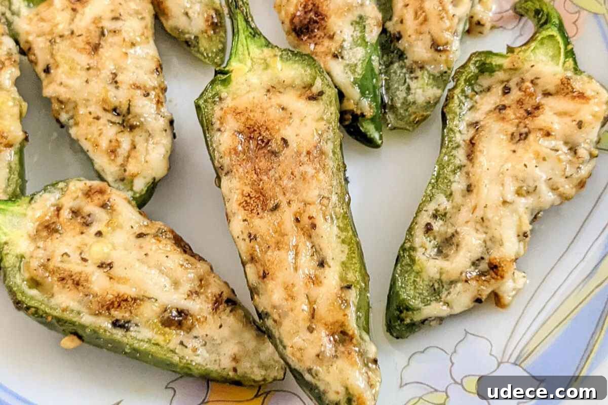 Crispy Air Fryer Vegetable Sides That Steal the Show 5 Jalapeno poppers on a plate