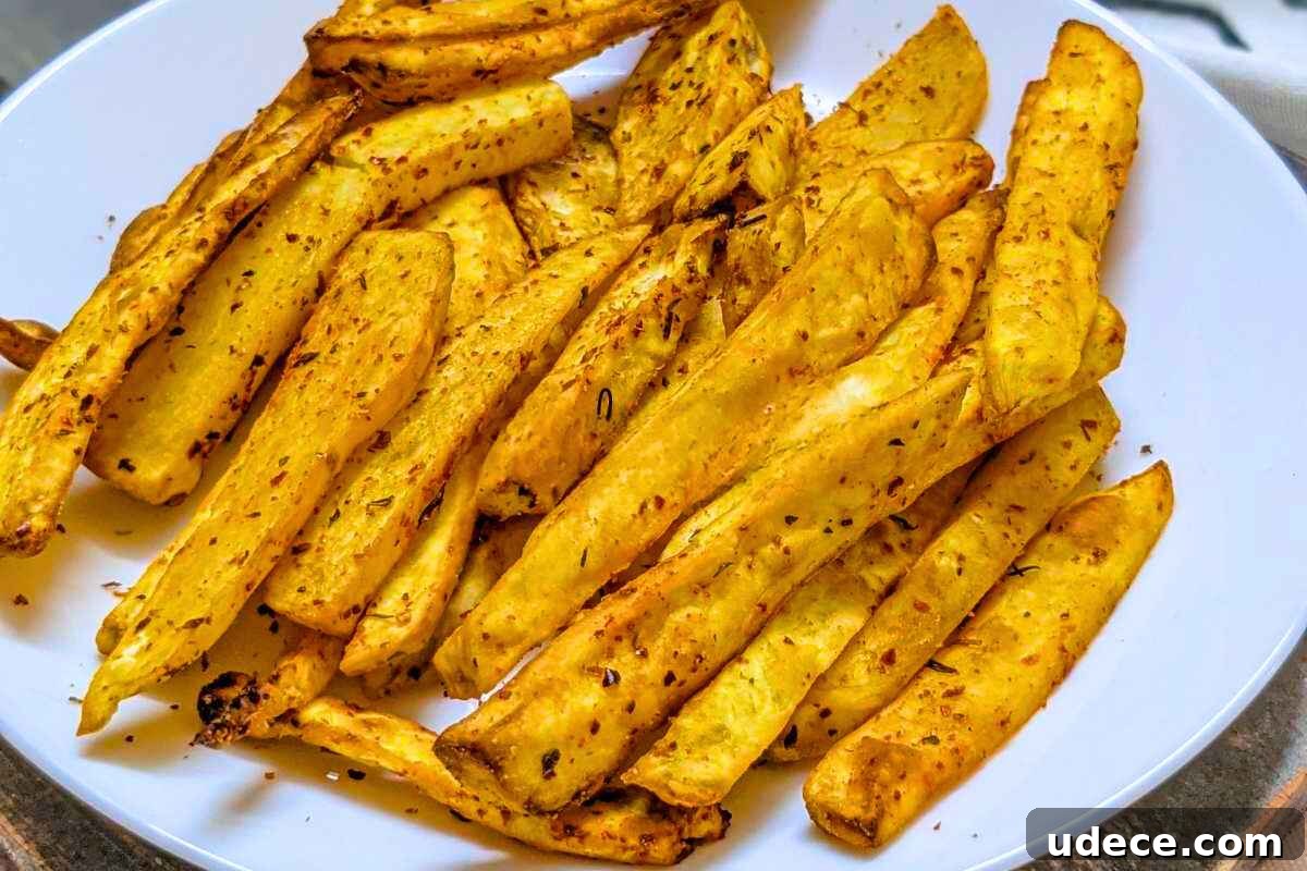 Crispy Air Fryer Vegetable Sides That Steal the Show 7 Sweet potato fries served on a plate