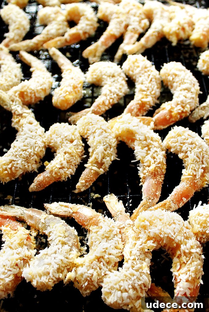 Crispy Baked Coconut Shrimp with Pineapple and Sweet Chili Dips 3 Baked Coconut Shrimp with 2 sauces. Easy to make. No frying required. #glutenfree #shrimp