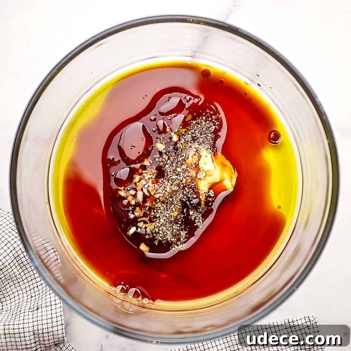 Grilled Balsamic Chicken with Garlic and Rosemary Marinade 4 mixing marinade ingredients in a glass container
