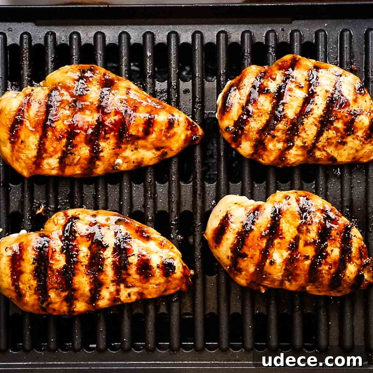 Grilled Balsamic Chicken with Garlic and Rosemary Marinade 7 grilling balsamic chicken on a grill