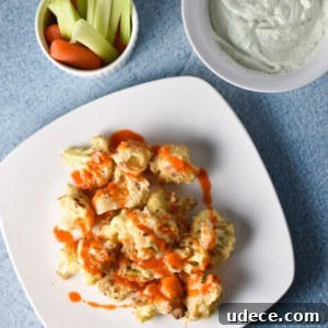 Buffalo cauliflower with faux blue cheese dip is a migraine friendly vegetarian alternative to the traditional game day food. Fresh goat cheese provides a tangy, creamy flavor!