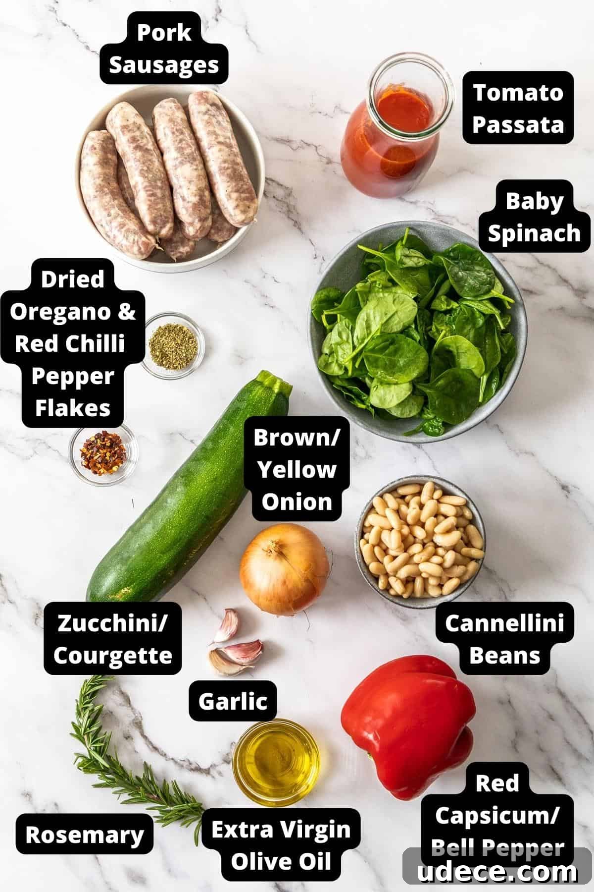 Mediterranean Sausage and Vegetable Casserole Recipe 3 Ingredients in this recipe on a white marble background.