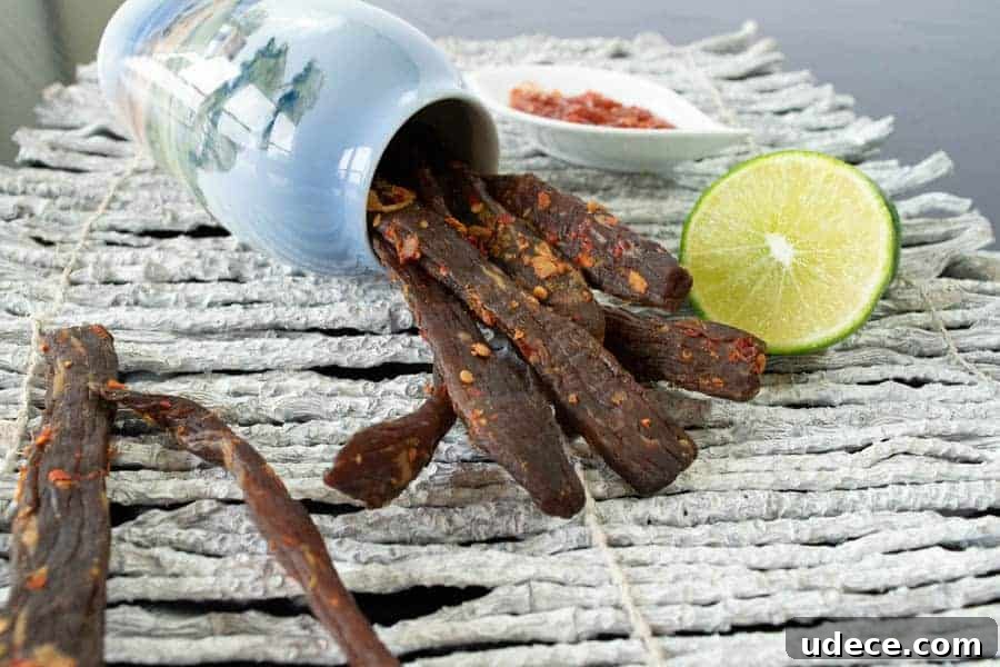 Chili Lime jerky with lime and chili garlic sauce in jar
