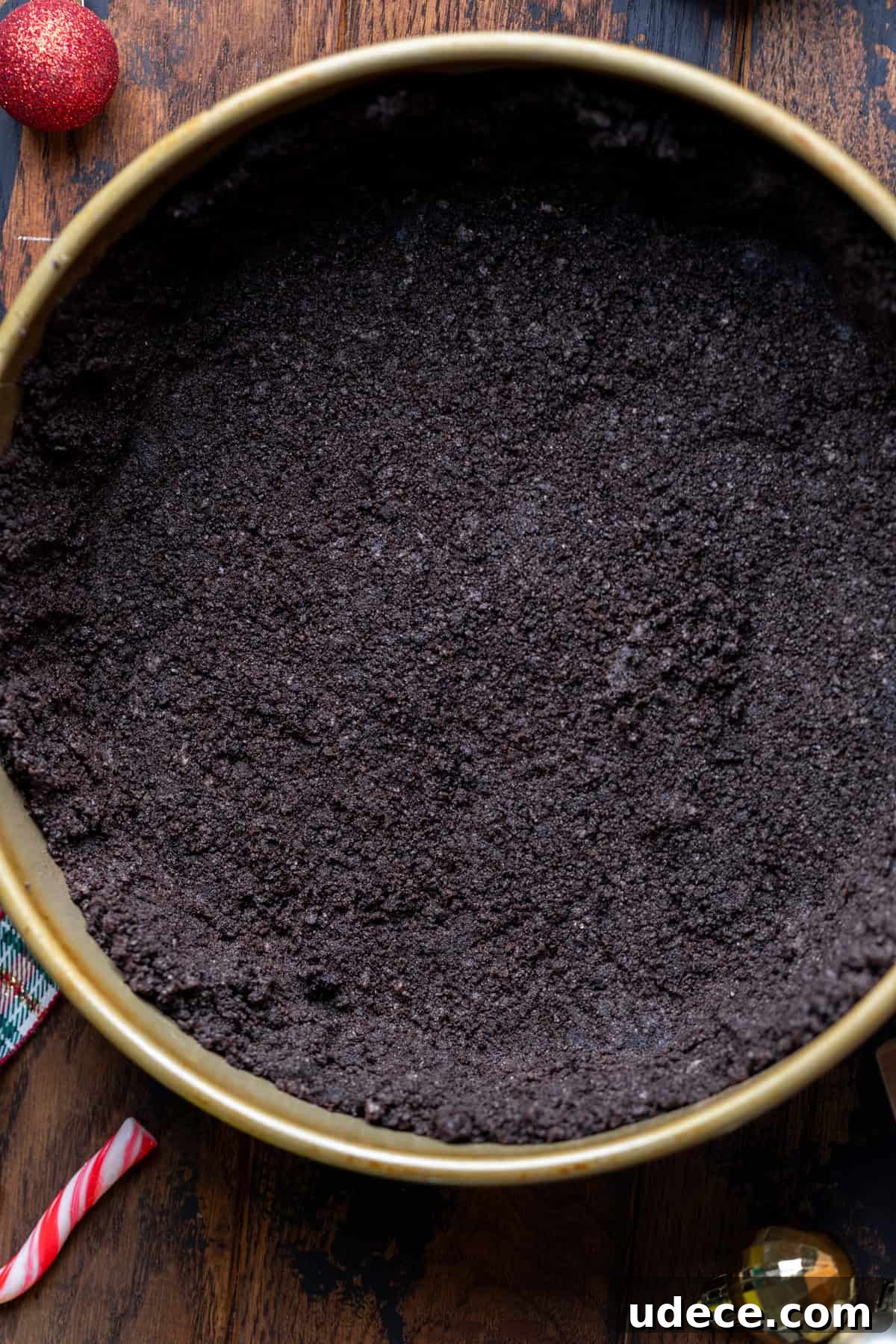 Oreo crust in a pan.