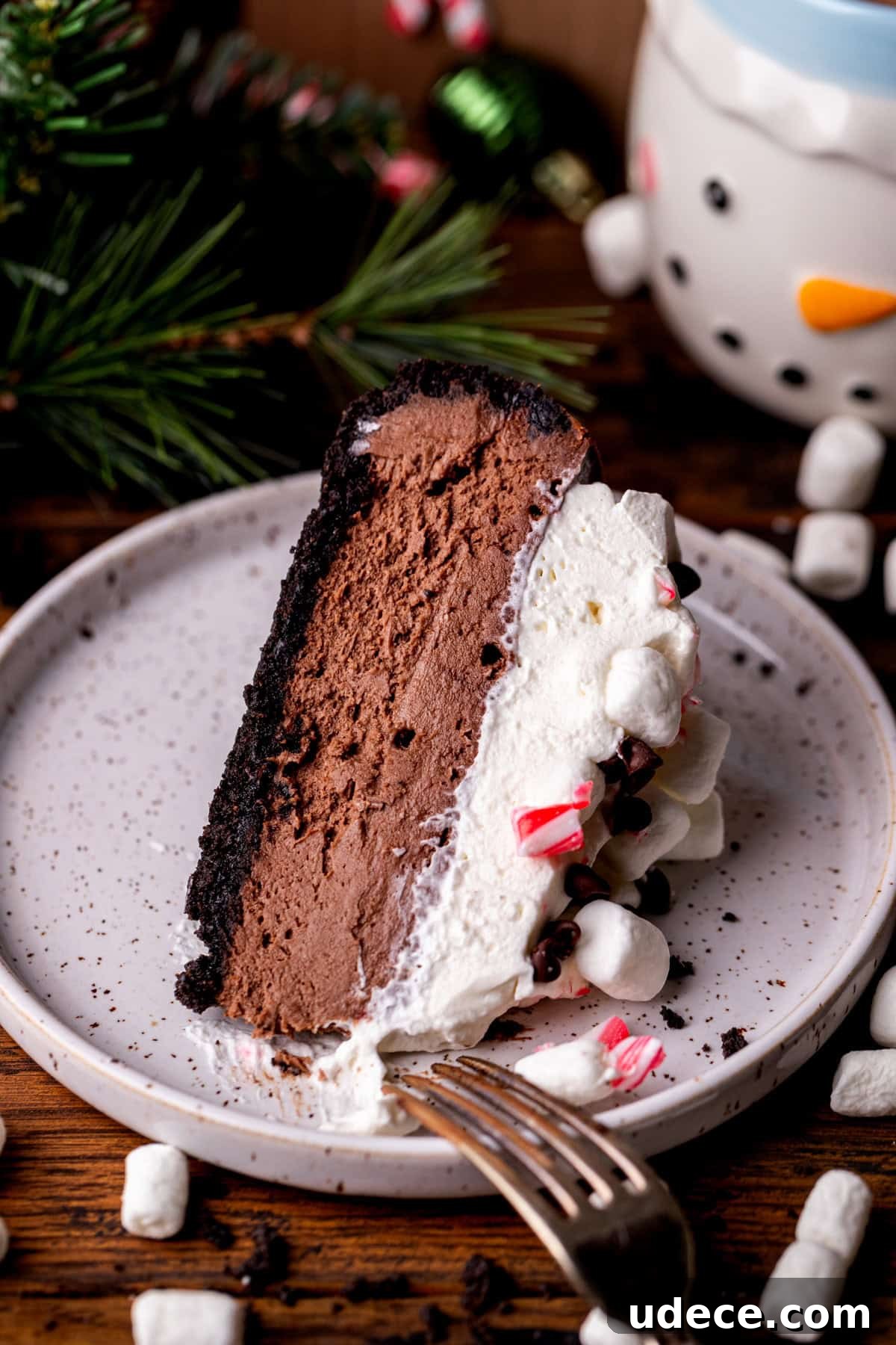 Slice of cheesecake on a plate.