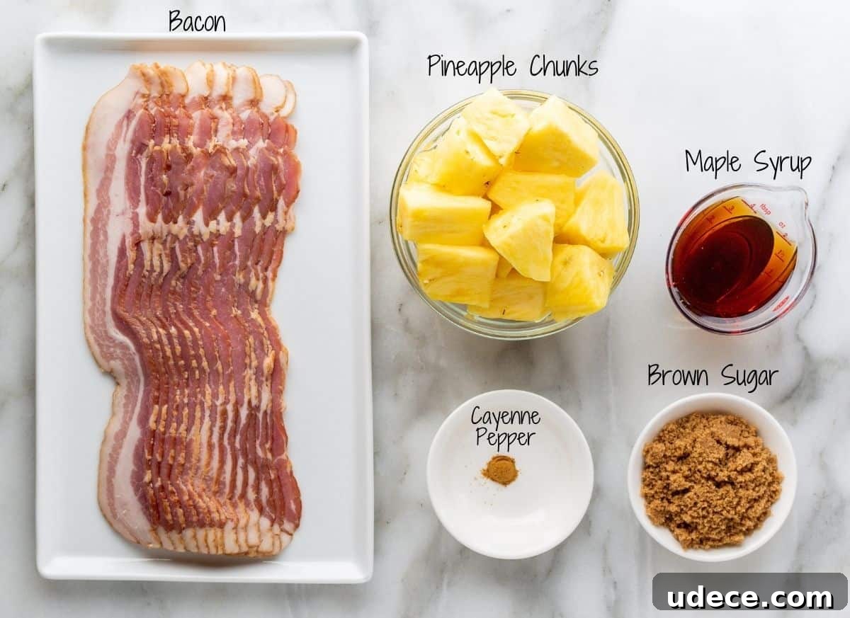 Crispy Bacon-Wrapped Pineapple Bites: Sweet and Savory Appetizer 3 Bacon Wrapped Pineapple Ingredients on a white marble board.