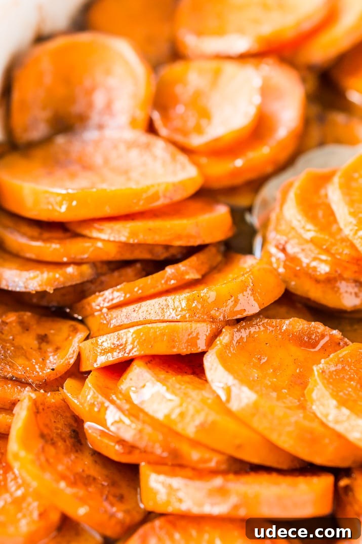 Candied Yams are a classic Thanksgiving side dish made from yams/garnet sweet potatoes and loaded with butter, sugar, honey, and spices.