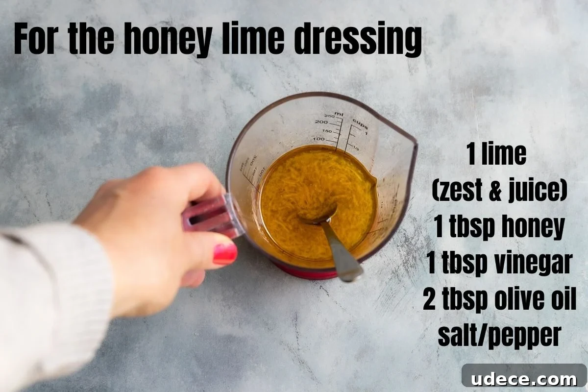 Someone holding a jug of honey lime dressing for halloumi skewers. There's also a list of the ingredients written on the image: 1 lime, honey, vinegar, olive oil, salt/pepper.