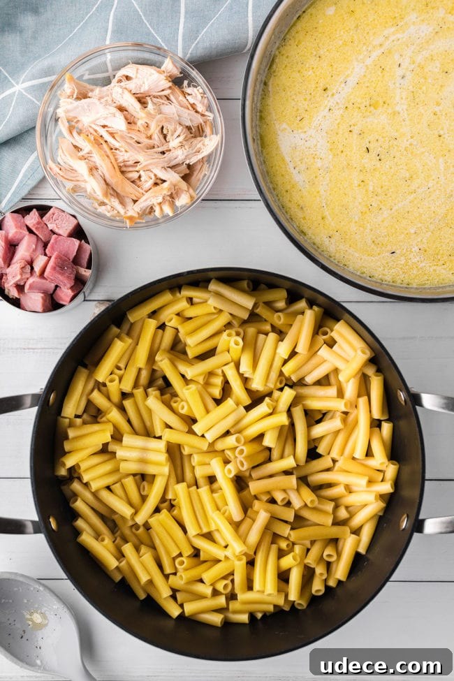 Creamy Chicken Cordon Bleu Pasta Bake 4 cooked pasta in a large sauce pan
