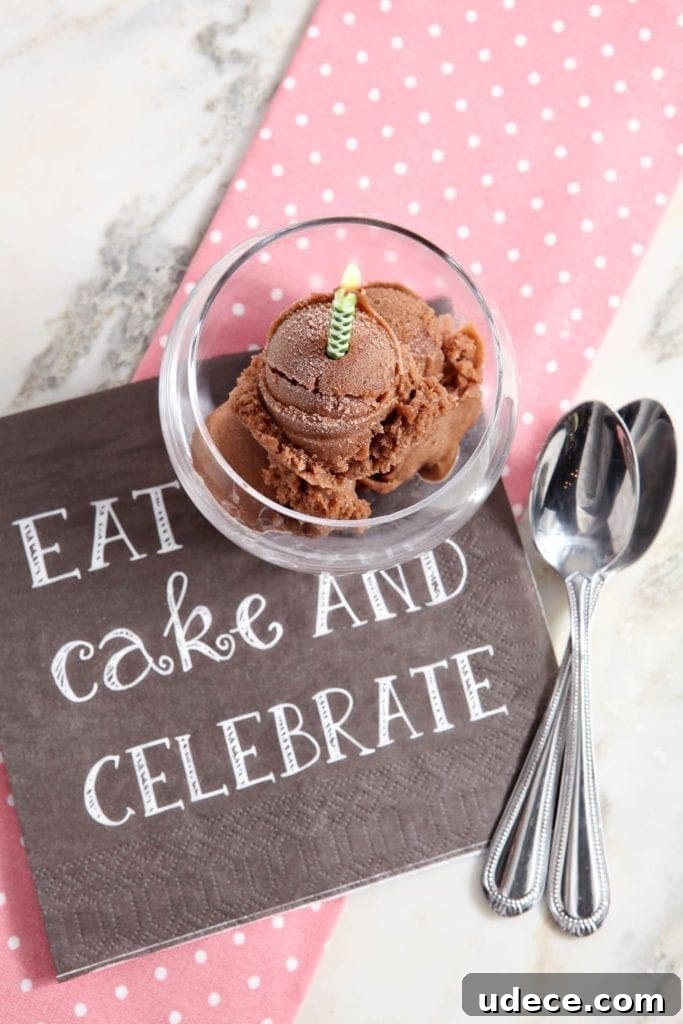 Decadent Chocolate Banana Ice Cream Recipe — Dairy-Free Treat 2 Overhead view of chocolate banana ice cream in glass with lit birthday candle