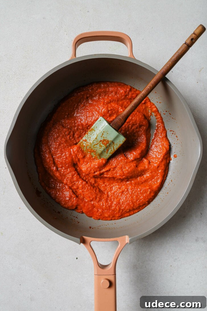 Authentic Butter Chicken Recipe: Tried and Perfected After 20 Tests 26 Puréed tomato/onion mixture in skillet with a rubber spatula.