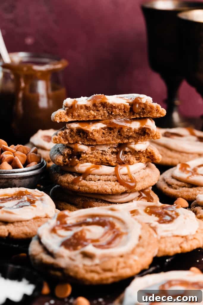 A stack of butterbeer cookie halves with golden goblets in the background.