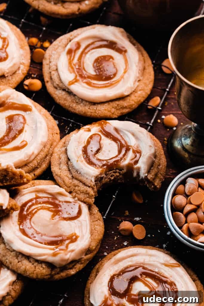 Butterbeer cookies on a vintage wire rack, with a bite missing from one.