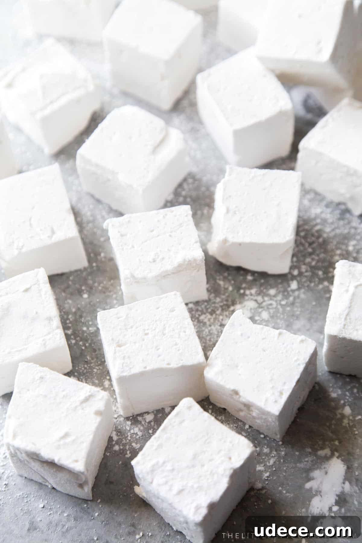 How to Make Fluffy Homemade Marshmallows at Home 16 homemade honey vanilla marshmallow squares.