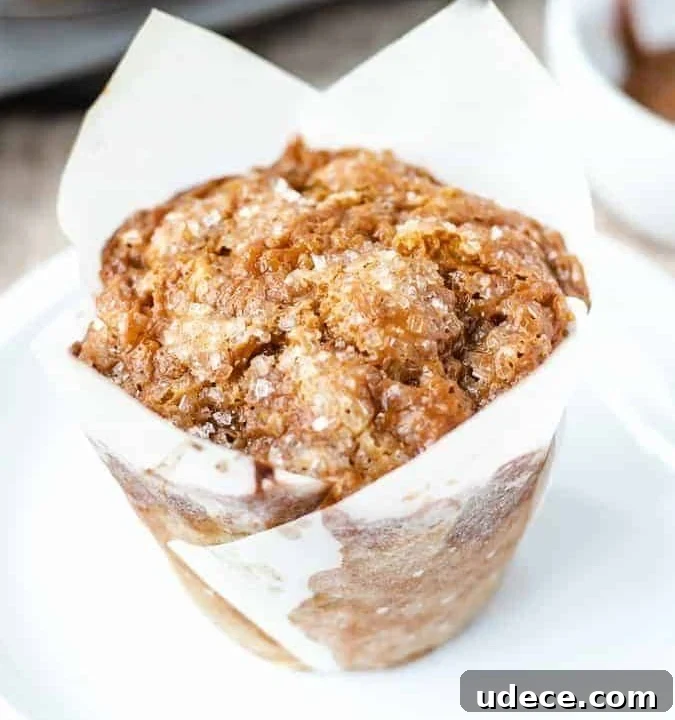 Close up shot of banana dulce de leche muffin on a white plate