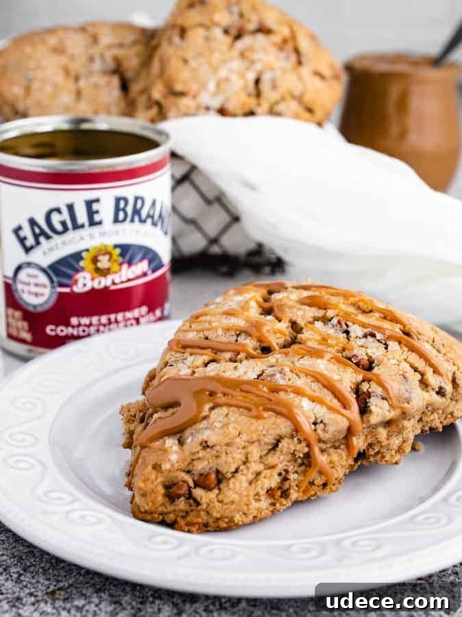 Dulce de Leche Scones Recipe — Buttery Caramel Scones Guide 5 Dulce de Leche Scone on a plate with basket of scones behind