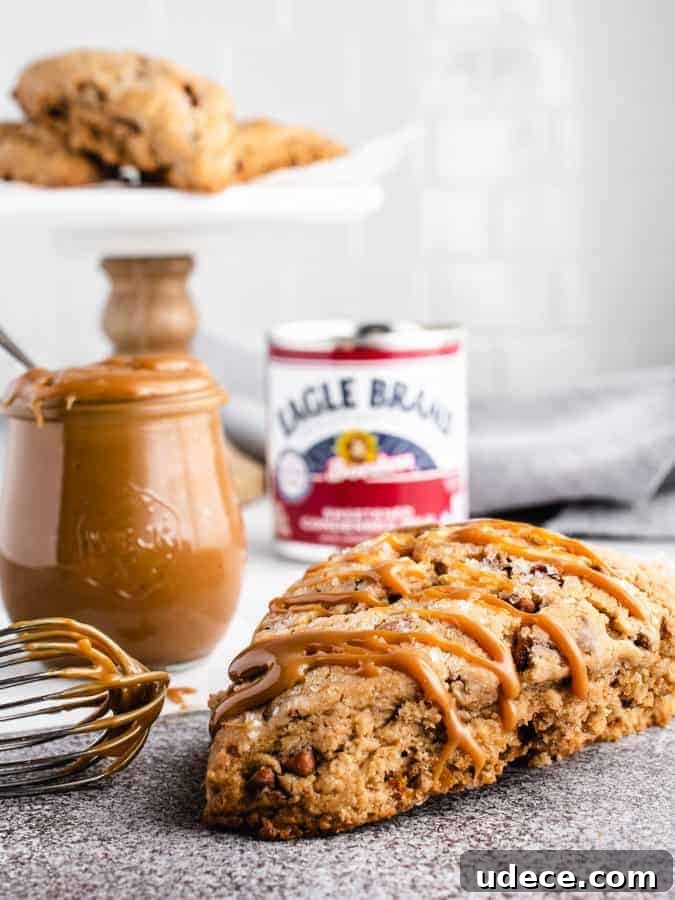 Dulce de Leche Scones Recipe — Buttery Caramel Scones Guide 9 Dulce de leche scone with whisk and jar of dulce de leche next to it