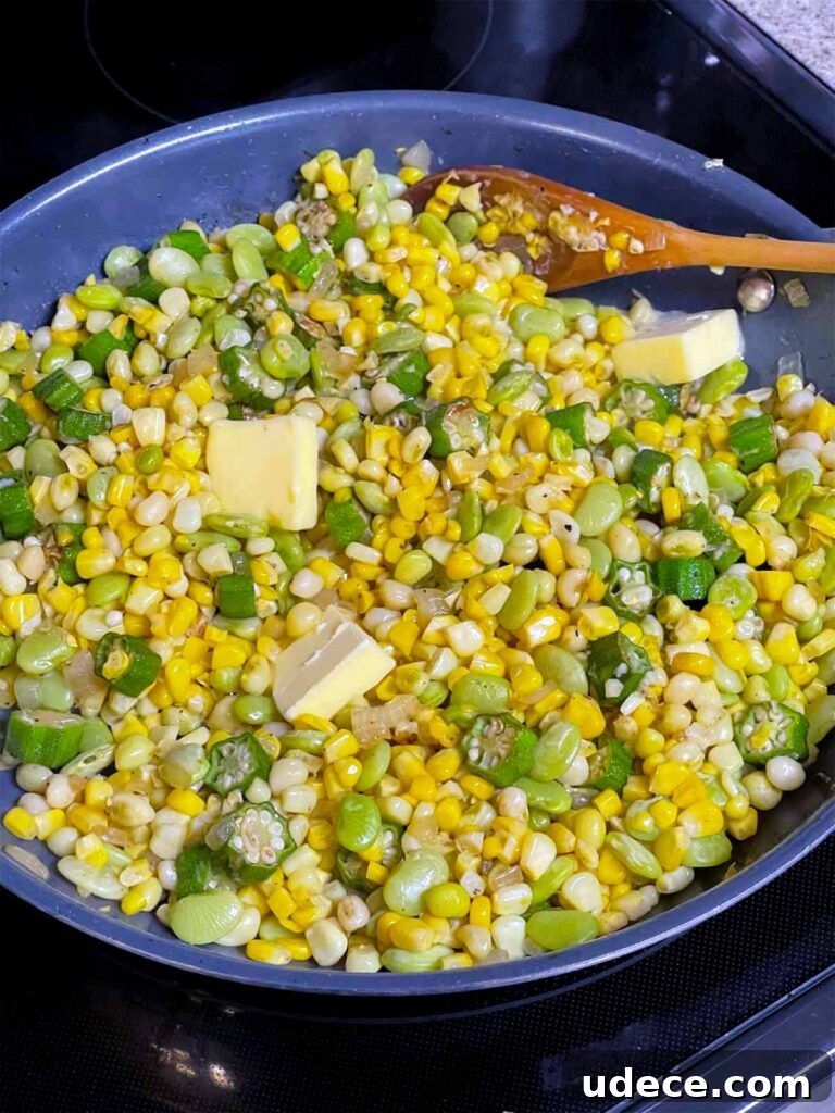 Fresh Summer Succotash Recipe with Corn, Beans & Peppers 5 Corn, lima beans, peas, and butter added to the okra and onions for succotash recipe.