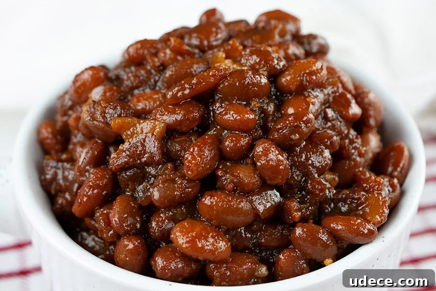 Fresh Summer Succotash Recipe with Corn, Beans & Peppers 9 Slow Cooker Boston Baked Beans in a white ramekin.
