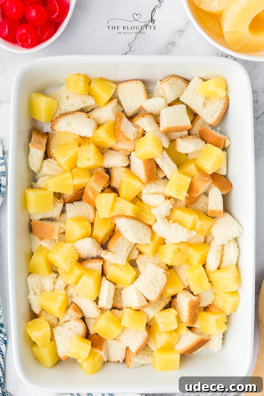 Creamy Pineapple Casserole with Crunchy Topping Recipe 7 Pineapple mixture over bread in baking dish