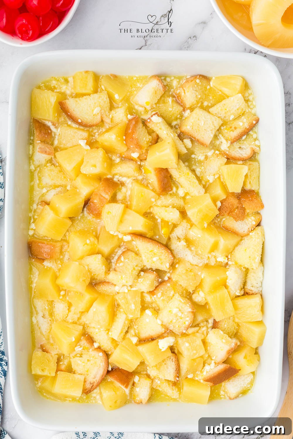 Creamy Pineapple Casserole with Crunchy Topping Recipe 8 Pineapple mixture over bread in baking dish