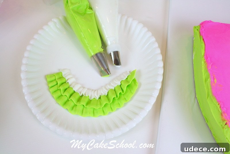 Cupcakes piped to match the watermelon cake. Watermelon cupcakes