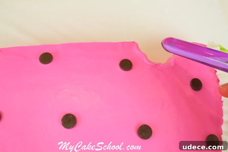 Add small details like bite marks for realism. Watermelon cake bite detail