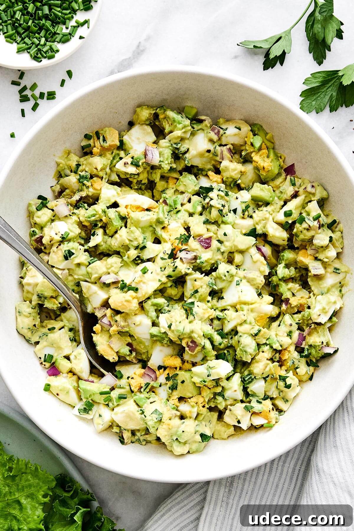 A bowl of avocado egg salad.