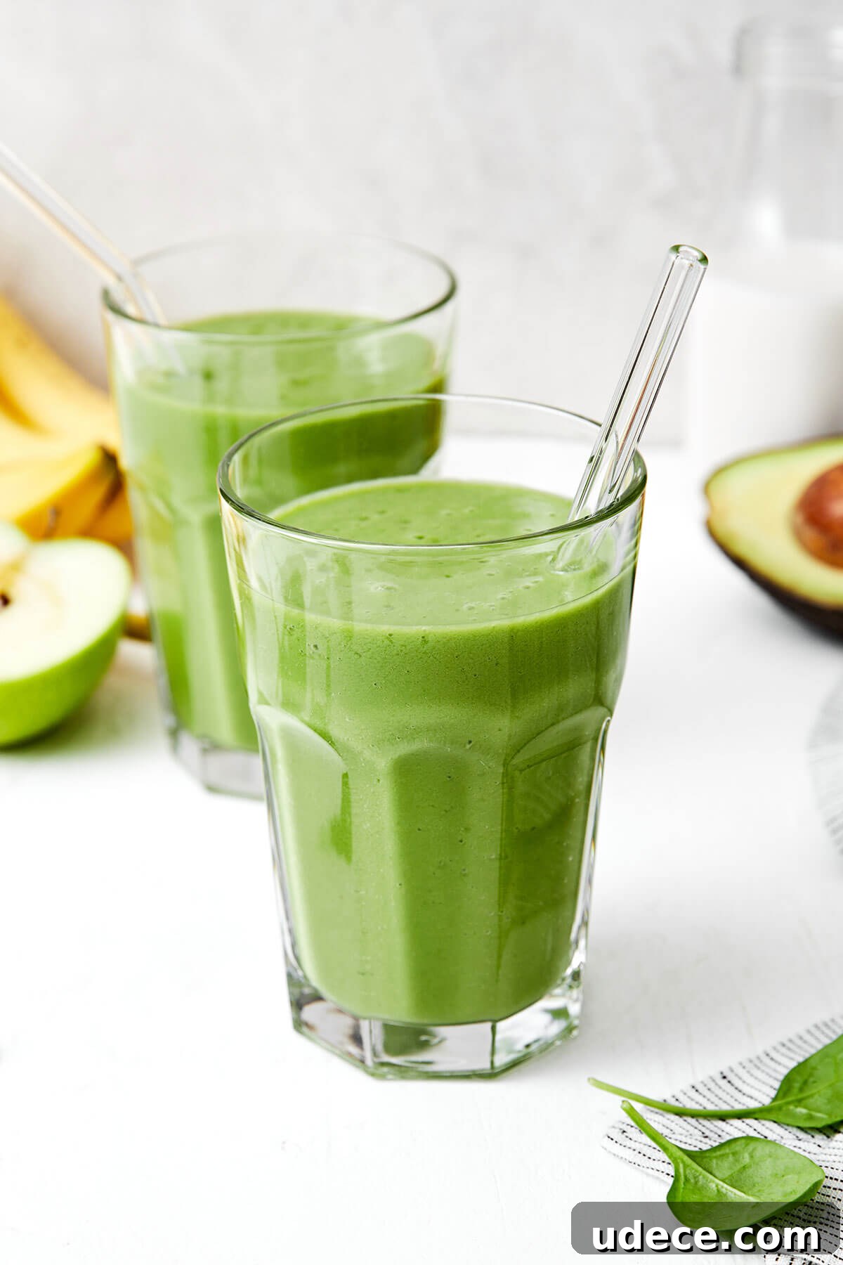 Glasses of green smoothie.