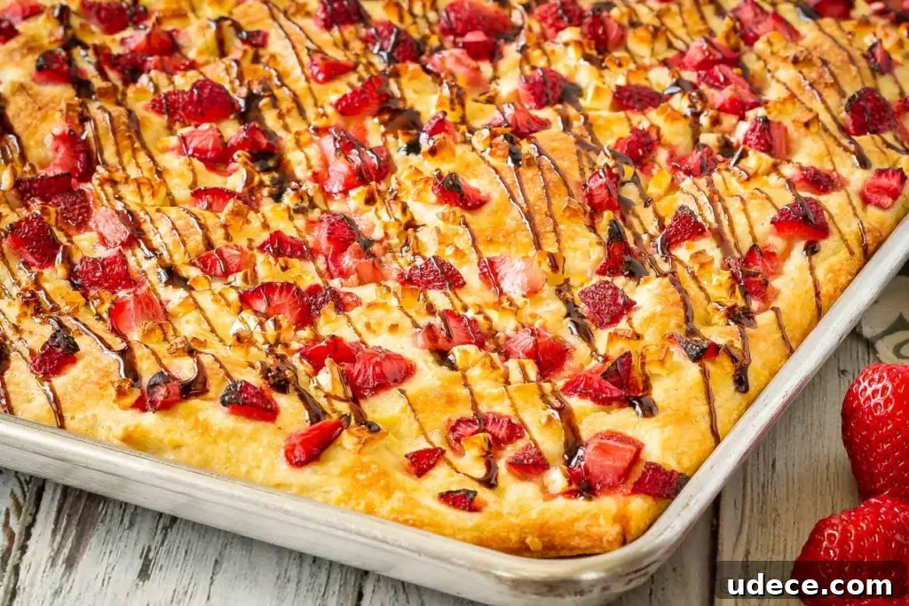Strawberry and Feta Focaccia Recipe — Sweet Savory Summer Bread 3 Focaccia topped with strawberries and feta cheese.