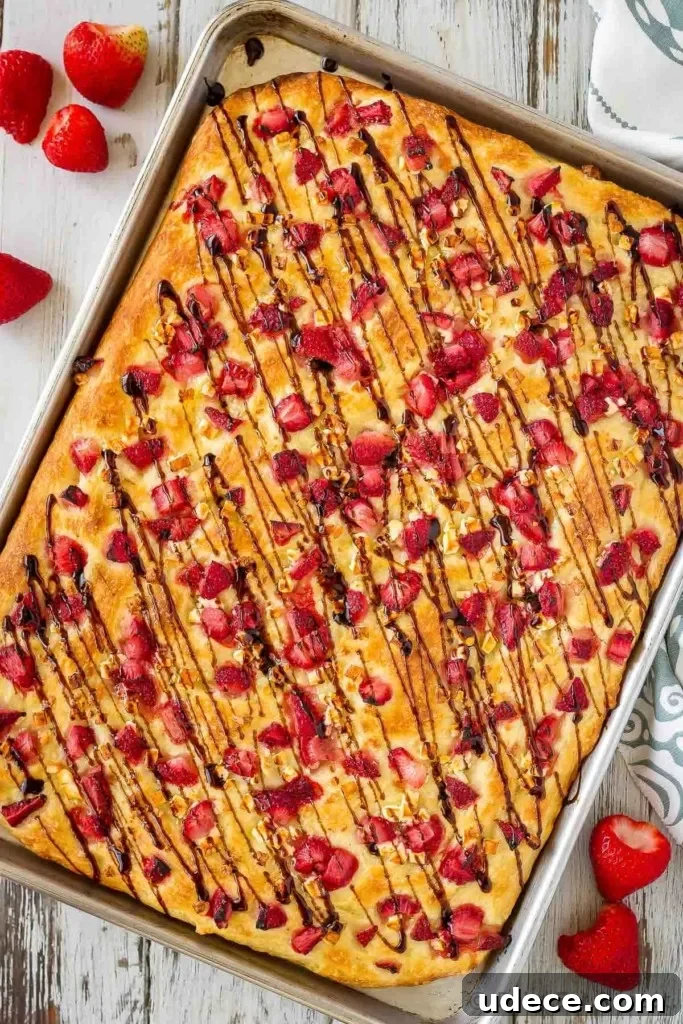 Strawberry and Feta Focaccia Recipe — Sweet Savory Summer Bread 5 Slices of focaccia with strawberries and feta.