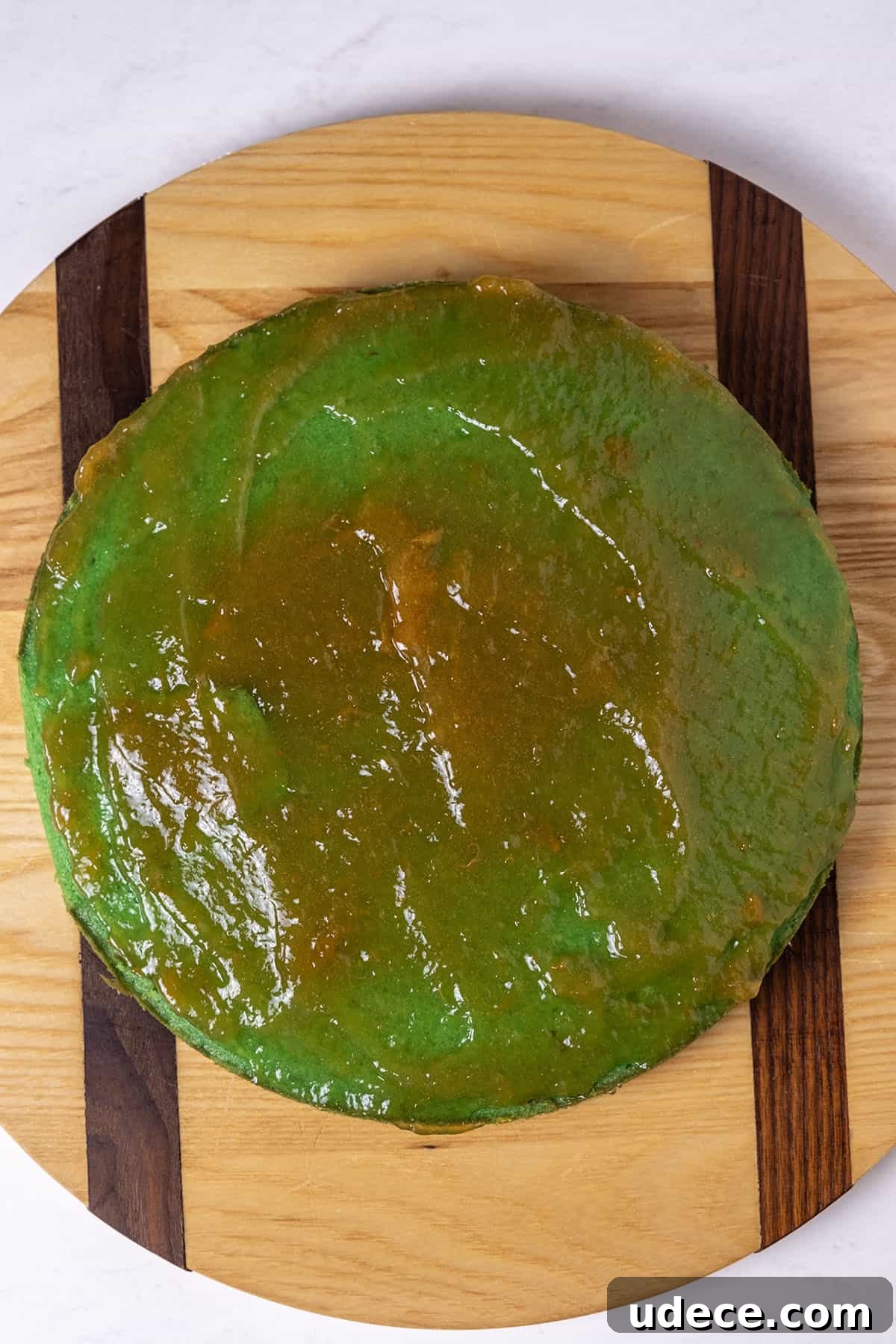 apricot jam spread on first layer