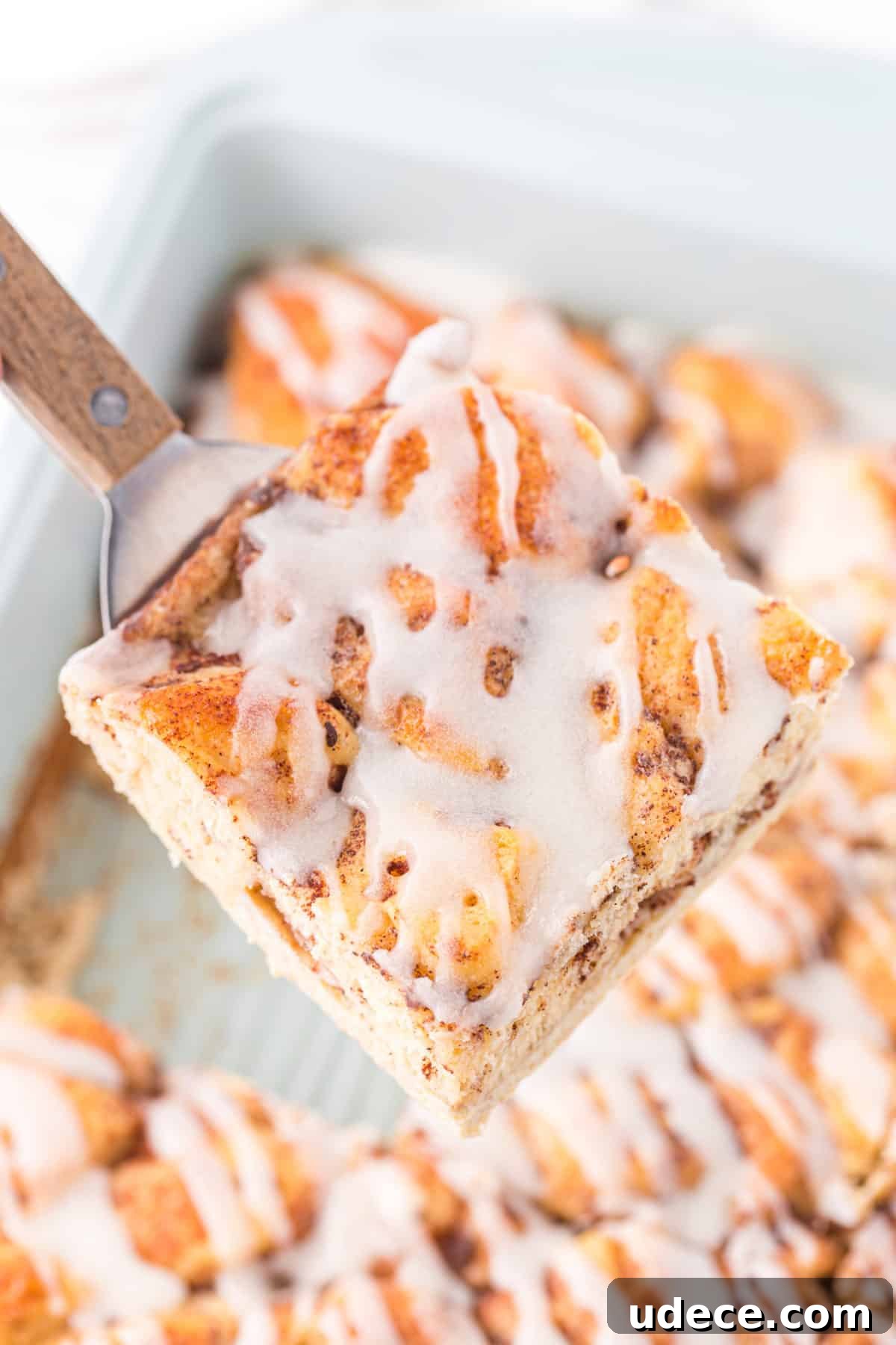 casserole on metal spatula above the rest of the casserole
