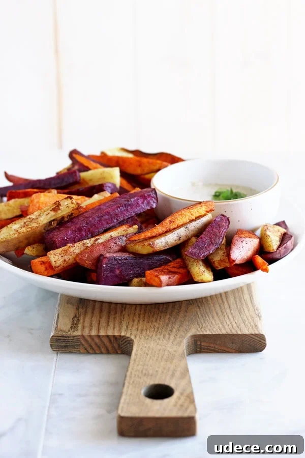 Sweet potato sticks on a large white plate.