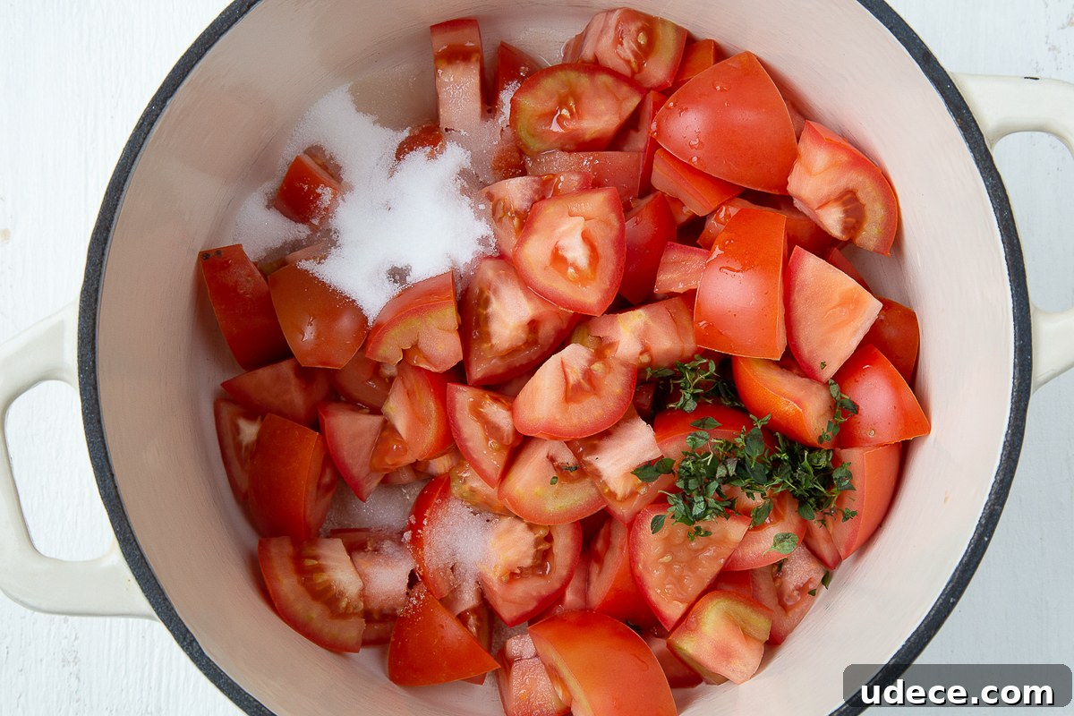 Homemade Tomato Jam Recipe: Sweet & Savory Preserving Guide 5 tomato jam ingredients in a dutch oven