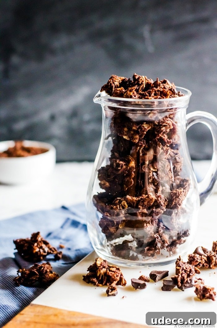 Chocolate Coconut Granola Recipe for Crunchy Homemade Clusters 2 jar filled with clusters of chocolate coconut granola