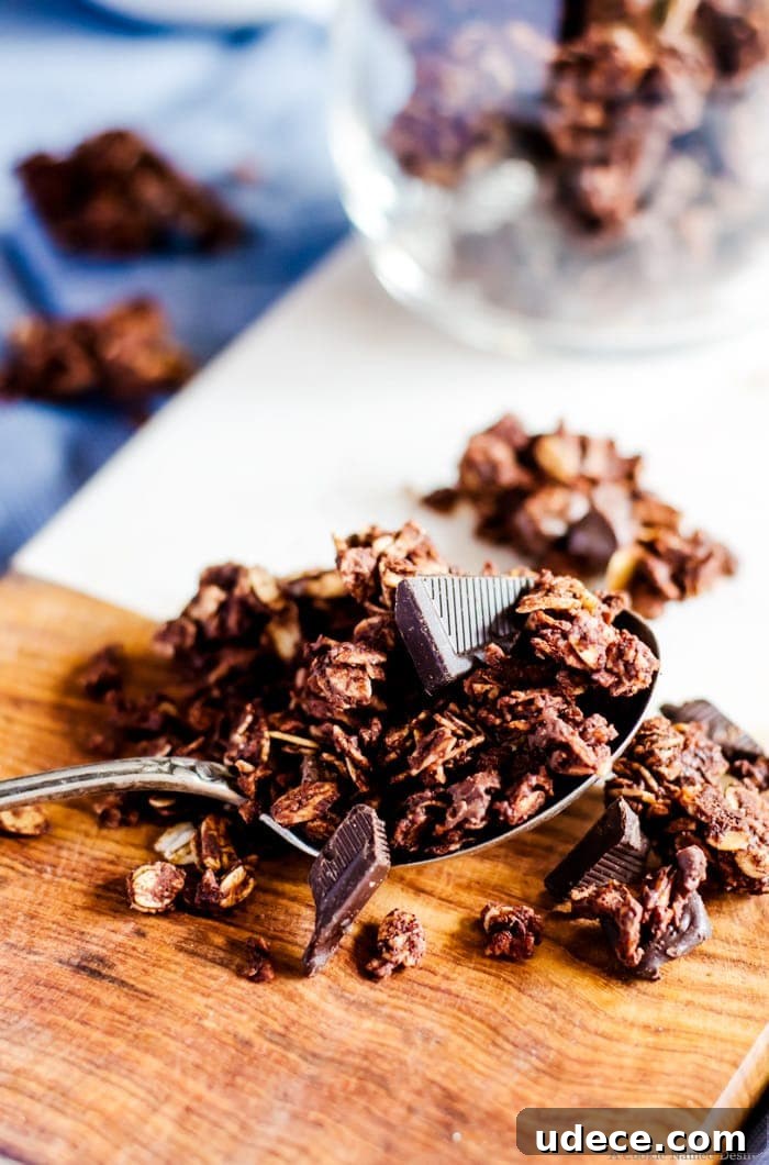Chocolate Coconut Granola Recipe for Crunchy Homemade Clusters 5 close up spoonful of granola