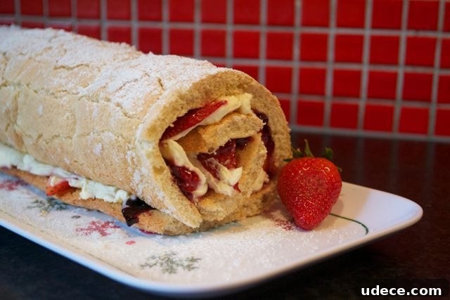 Simple Swiss Roll Recipe filled with fresh fruit
