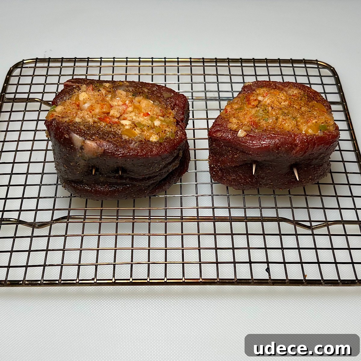 Grilled Stuffed Filet Mignon on a Weber Kettle Grill 6 stuffed filet mignon on wire rack ready for grilling