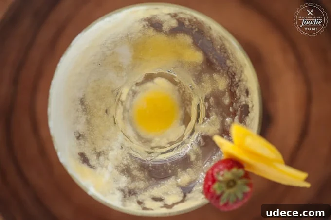 Mango Coconut Daiquiri Recipe: Tropical Cocktail Guide 8 looking down at an empty cocktail glass