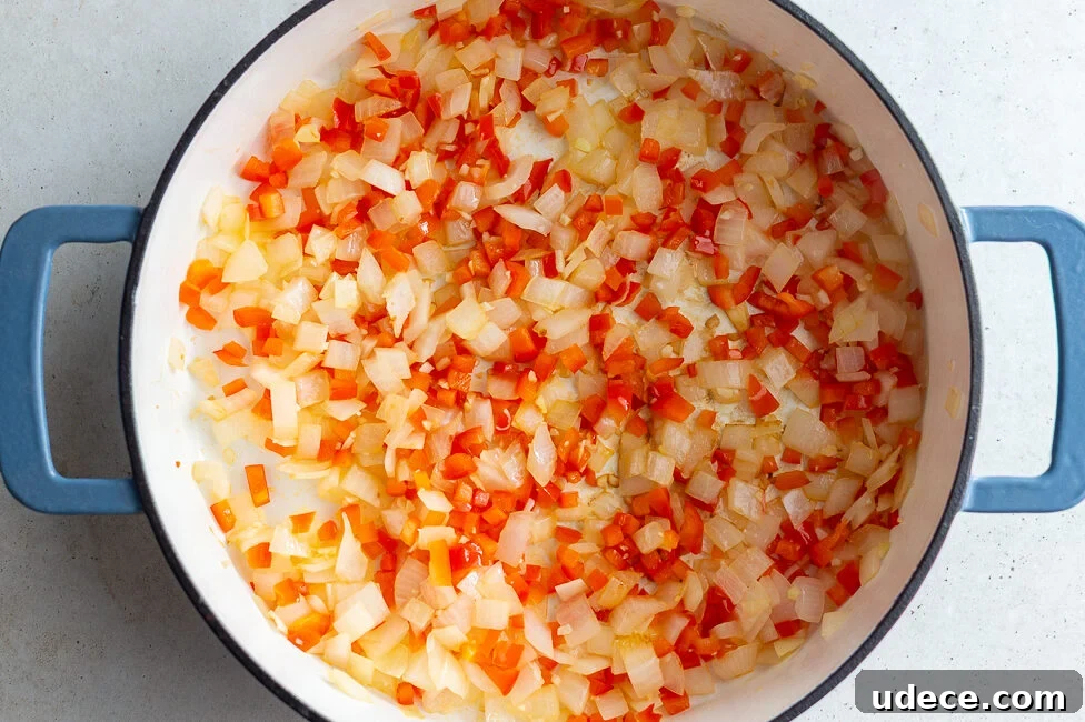 Vegan Lentil Sloppy Joes Recipe for Flavorful Plant-Based Sandwiches 6 how to make vegan sloppy joes: saute veggies in a pan