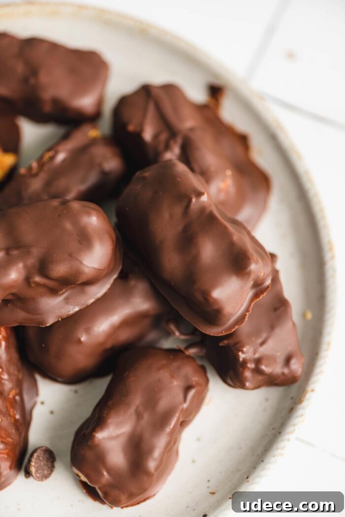 Homemade Butterfinger Candy Recipe Without Candy Corn 9 A plate of small homemade chocolate candy bars.
