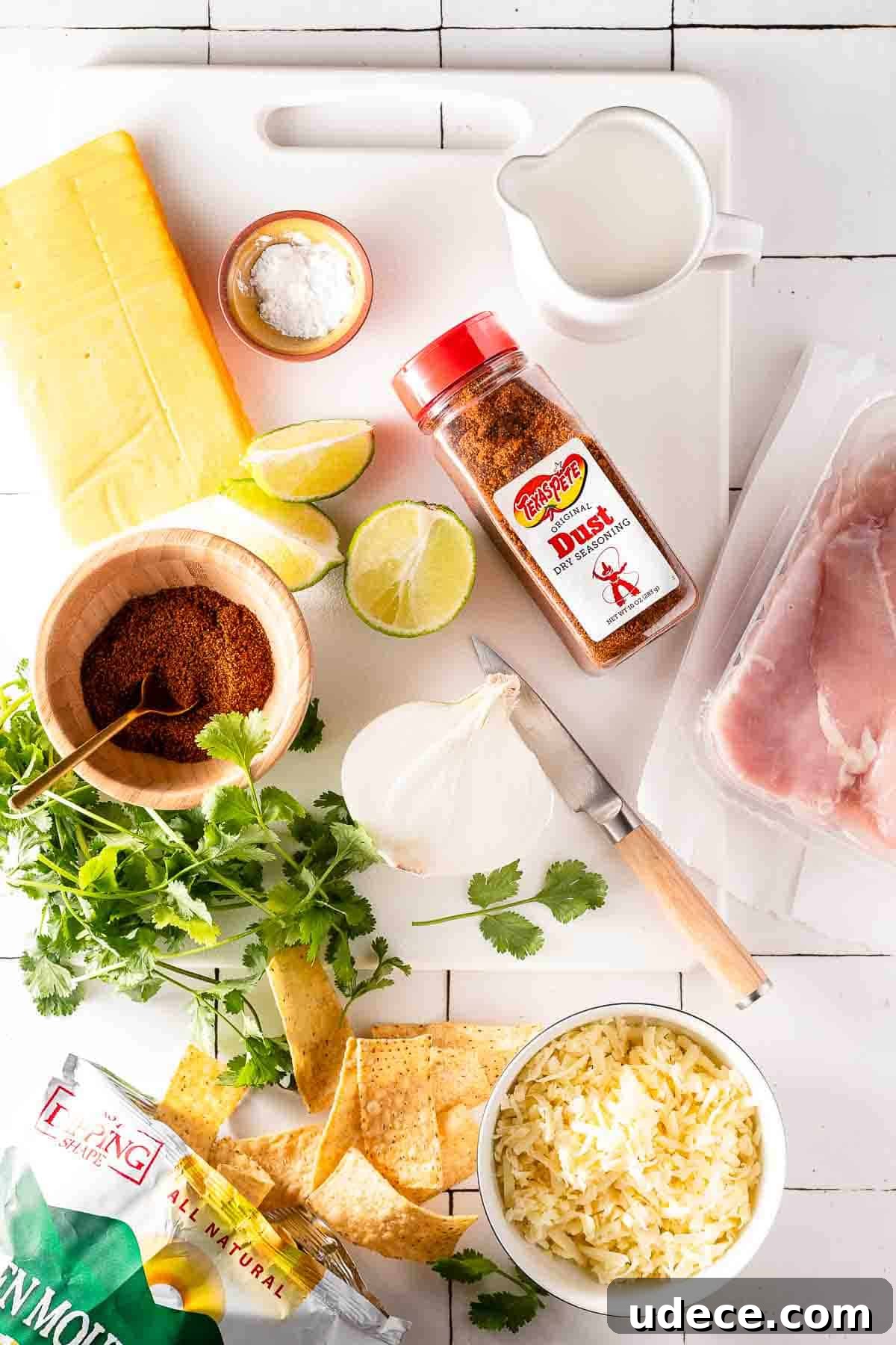 Spicy Queso Chicken Nachos Recipe for Game Night 3 recipe ingredients on cutting board