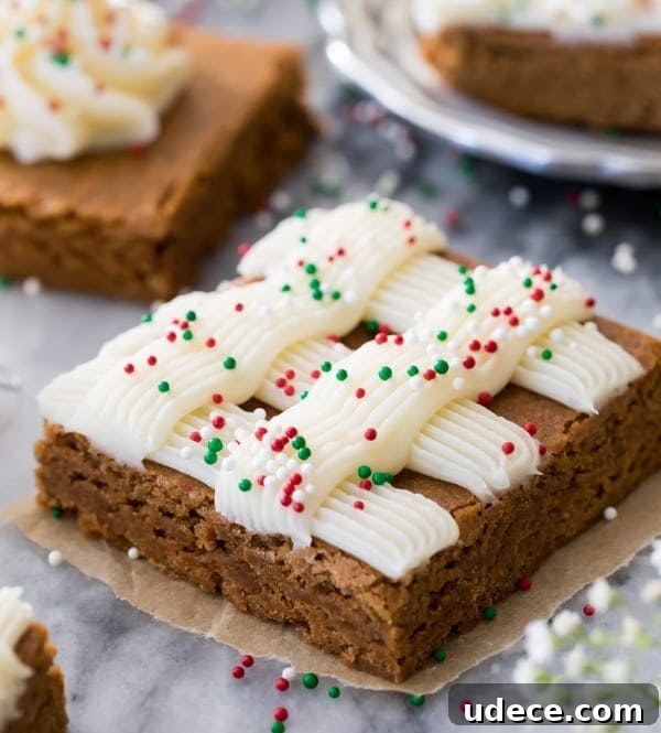 Gingerbread Layer Cake Recipe with Spiced Cream Cheese Frosting 13 Gingerbread bar on marble surface