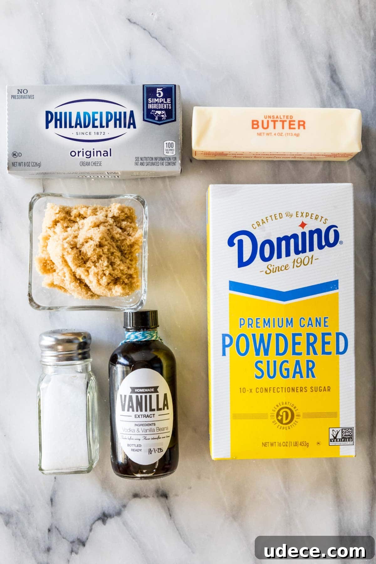 Gingerbread Layer Cake Recipe with Spiced Cream Cheese Frosting 4 Overhead view of ingredients including brown sugar, cream cheese, powdered sugar, and more.