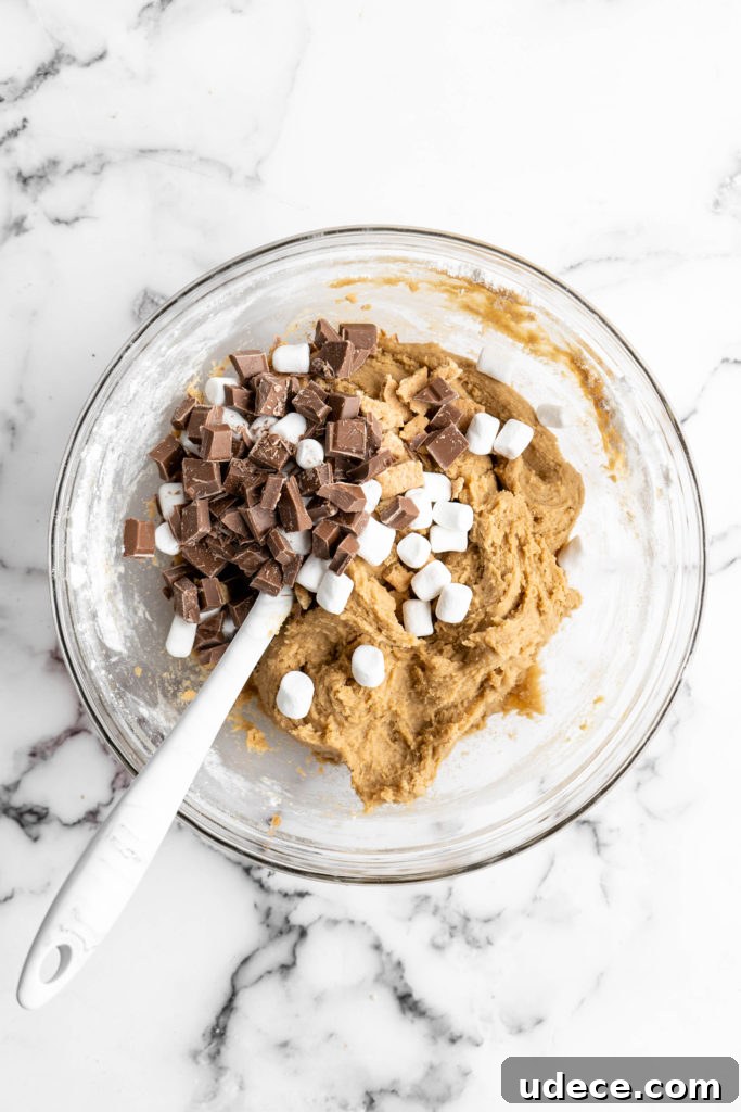 SunButter S'mores Cookies with Graham Crackers Recipe 5 s'mores cookie batter with chocolate, marshmallows and graham crackers on top