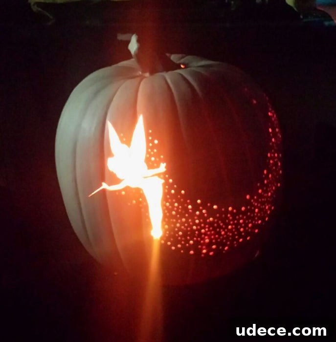 25+ Creative Pumpkin Carving Ideas for Halloween Decorations 21 TinkerBell Pixie Dust Carved Pumpkin | 25+ Creative Carved Pumpkins