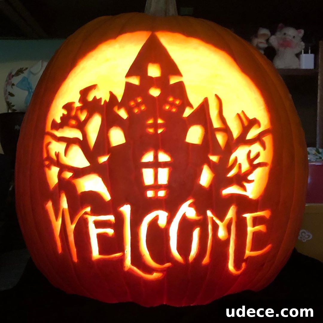 25+ Creative Pumpkin Carving Ideas for Halloween Decorations 24 Haunted House Welcome Carved Pumpkin | 25+ Creative Carved Pumpkins