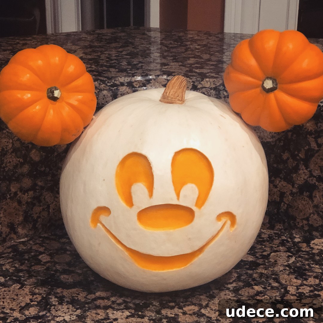 25+ Creative Pumpkin Carving Ideas for Halloween Decorations 26 Mickey Mouse Carved Pumpkin | 25+ Creative Carved Pumpkins